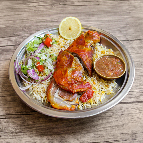 Lamb Mandi - traditional Yemeni rice dish with spiced lamb
